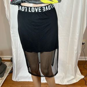 Fashion Magazine soft & comfortable skirt with sheer layered panel.